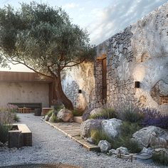 a stone building with trees and rocks around it