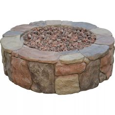 a stone fire pit with rocks around it