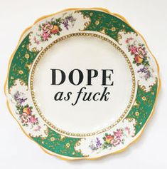 a green and white plate with the words dope as fock written on it