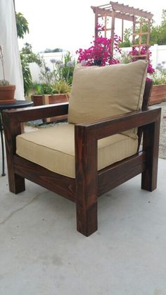 a wooden chair sitting on top of a patio