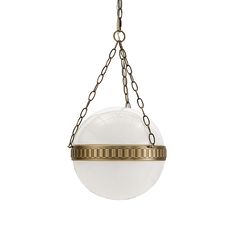 a light fixture hanging from a chain on a white wall with a round glass ball in the center