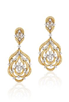 18 karat gold and diamond drop earrings by fine jewelry house Andreoli. 18 karat Gold, 25.3 grams 3.02 carat Diamond Expertly crafted in Italy Andreoli is known for creating bold heirloom steeped in Italian cultural heritage. Their collection of statement wearable art pieces can be worn during celebrations and to elevate your everyday. Estimated Delivery7 working days Customs Duties & Taxes may apply. Shipped from USA Gold And Diamond Earrings, Diamond Chandelier Earrings, Cocktail Earrings, Quince Ideas, Jeweled Earrings, Diamond Dangle Earrings, Precious Jewels, Diamond Drops, Van Cleef