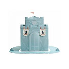 a blue castle shaped play set with a flag sticking out of it's door