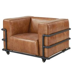 a brown leather chair sitting on top of a metal frame