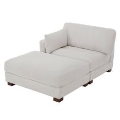 a white chaise lounge chair and footstool on a white background with no one in it