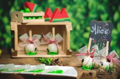 some green and white candies are on a table