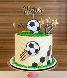 a soccer themed birthday cake on a table