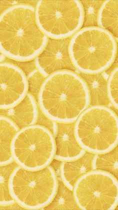 many slices of lemon are arranged together