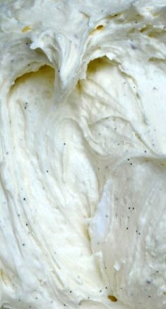 a close up view of some white frosting