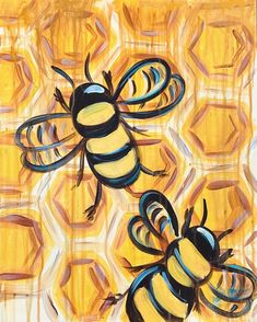 two bees sitting on top of each other in front of yellow and blue hexagonal tiles