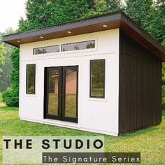 a small house with the words the studio on it