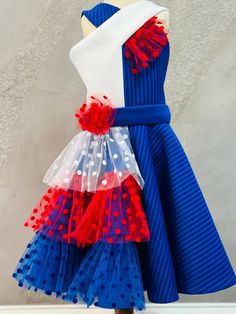 Gorgeous Red White Blue outfit - royal blue striped neoprene with white and red polka dot accents .  Zipper back. This outfit would be perfect for all important events such as Birthday, Party, Pageant, photo session.  Materials: neoprene, tulle. Colors and sizes. This outfit can be made in Red White Blue  colors and in any size. Outfit is tailored to order in any standard size. The size chart is the picture of the listing. For custom outfit we would need: chest, waist, full height, length from shoulder to waist, length  from waist to skirt's bottom. Recommendations for care: Dry cleaning , soft or steam  iron. White Blue Outfit, Red White Blue Outfit, Neoprene Dress, Pageant Girls, Girls Unique, Patriotic Outfit, African Print Fashion Dresses, African Print Fashion, Blue Outfit