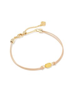 Give back in style with the Emilie Gold Corded Bracelet in Light Yellow Drusy. A delicate and dainty addition to your wrist stack, this meaningful bracelet will easily become a part of your everyday layered look. Wrist Stack, Kendra Scott Bracelet, Wrist Stacks, Bar Jewelry, Engraved Initials, Birthstone Colors, Rose Necklace, Zodiac Jewelry, Ring Watch