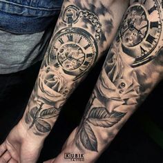 two people with tattoos on their arms and one has a pocket watch in the middle