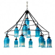 a chandelier with blue glass bottles hanging from it