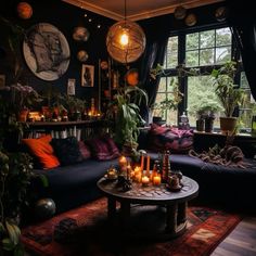 a living room filled with lots of plants and candles