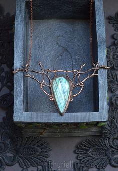 An earthly labradorite necklace in a shape of copper branches embracing gorgeous flashy labradorite that would be at home on an elven lady - or a modern day faerie. A tiny wearable fairy tale to adorn your neck and bring a bit of very special magic to your everyday look: Copper Forest is old. So old that even the oldest on faeries can't really remember it growing - some say it's as old as the magic itself. Roots of the copper trees reach deep into the earth, drinking from the earth's flaming hea Nature-inspired Copper Wire Necklace As Gift, Mystical Silver-colored Copper Necklace, Mystical Hand Forged Labradorite Necklace, Mystical Copper Pendant Jewelry, Nature-inspired Copper Gemstone Necklace, Faery Jewelry, Nature-inspired Copper Wire Wrapped Necklace, Witchy Boho, Soft Solder