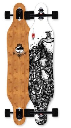 two skateboards with black and white designs on them