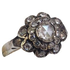 Antique early victorian era 1850s rose cut diamond ring in flower designe silver topped and gold Antique Rings Victorian 1stdibs, Victorian Rings With Rose Cut Round Diamonds, Victorian Wedding Cluster Ring With Rose Cut Diamonds, Victorian Silver Cluster Ring With Rose Cut Diamonds, Victorian Hallmarked Flower Ring, Victorian Red Rings With Rose Cut Diamonds, Rosecut Diamond Ring, Victorian Flowers, Succulent Wedding