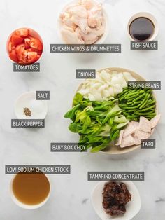 the ingredients to make chicken broth on a plate