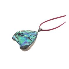 Free form piece of abalone shell set into a silver frame with a silver bale hanging from a cord necklace that must be tied so it is adjustable. Marked silver inside bale. Cord: Length 18.5 inches Height: 0.12 Width: 0.06 Pendant: Height: 2 in Length: 1.75 in Width: 0.25 in    Due to the unique nature of this product, all sales are final. This item is not eligible for the standard Chairish return policy. Unique Nature, Abalone Shell, Cord Necklace, Organic Modern, Silver Frame, Antique Jewelry, Turquoise Bracelet, Vintage Antiques, Jewelry Collection