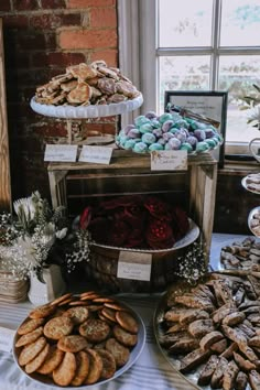 an assortment of cookies and pastries on display