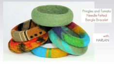 there are many different colored rings on the table with text above it that says, pringles and tomato needles felted bangle bracelets