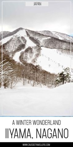 a snowy mountain covered in snow with the words japan written on it's side