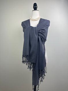 This is a light weight all season wool shawl. This versatile shawl can be used to dress up an outfit for a special evening, as wedding favors, travel wrap or as a neck scarf in the winter. Easy to carry anywhere, perfect for when you need it at a restaurant or at the office in air conditioning or a cool summer evening. Effortlessly give a dress a new look by simply adding this shawl. A must have when you travel! Measures 26"Wide x 74"Long COLOR MATCHING/ACURACY The color is very close however is Winter Gift Shawl, Winter Gift Wrap Shawl, Elegant Gray Scarves For Fall, Elegant Gray Shawl For Winter, Travel Wrap, Wool Shawl, Purple Lilac, Neck Scarves, Warm Winter