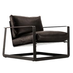 a black leather chair sitting on top of a metal frame