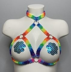 This Kandi Beaded Top comes in colorful neon colors! Easily connects with neon pink string in the back of the straps and the back of the choker to beautifully fit all sizes!! Beautifully Handmade Kandi Body Harness, Emo Sewing Projects, Kandi Harness Tutorial, Kandi Earrings, Kandi Top, Cute Pride Outfits, Kandi Purse, Kandi Harness, Beaded Harness