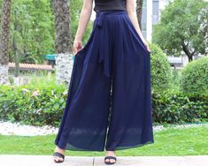 * A pair of chiffon pants, wide leg hem, like a skirt.  * Lightweight high quality chiffon fabric, fit for summer. * Materials: hight quality pearl chiffon(100% polyester) Shop sizing chart FYI ( actual body figures, not laying flat clothes measurements) Size XS (US 2, UK 6, German 32, French 34) Bust: fits bust around 33.5 inches/85cm Waist: fits waist around 26 inches/66cm Hips: fits hips around 36 inches/91cm Size S (US 6, UK 10, German 36, French 38) Bust: fits bust around 35.5 inches/90cm W Blue Wide Leg Pants For Summer Party, Elegant Blue Wide Leg Pants For Summer, Casual Blue Chiffon Bottoms, Elegant Summer Wide-leg Culottes, Elegant Wide Leg Pants For Spring, Elegant Wide Hem Pants For Spring, Spring Full-length Chiffon Bottoms, Spring Full Length Chiffon Bottoms, Flowy Blue Chiffon Bottoms