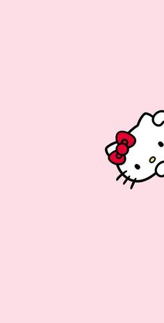 the hello kitty wallpaper is pink and has a bow on it's head