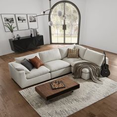 a living room with a large sectional couch