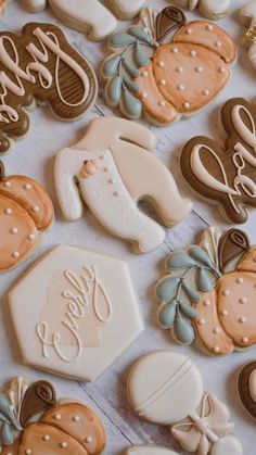 some decorated cookies are laying on a table