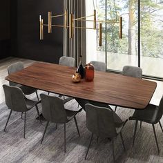 a dining room table with chairs around it