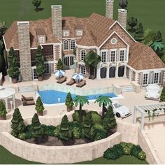 an aerial view of a large house with a pool