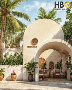 an outdoor dining area with palm trees and potted plants on the side of the building