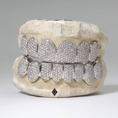 Check out our website www.IFANDCO.com Happy Holidays!  #CustomJewelry #IFANDCO Diamond Bottom Grills, Baddie Grillz, Vvs Diamond Grillz, White Gold Grillz, Gold Outline Tooth Grill, Iced Out Grillz, Gold Tooth