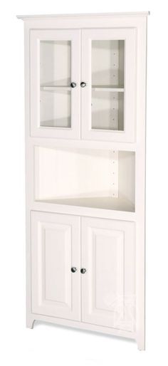 a white bookcase with glass doors and drawers on the bottom shelf is shown against a white background