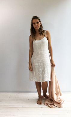 "Simple natural linen slip dress to wear as a night gown or as a base layer. Made from 100% pure linen. Simple. Eco-conscious. Smart choice. Available in soft white, creamy peach, natural taupe and black linens. For the best fitting of this dress please let us know the following measurements: - your height - your bust/waist/hip circumferences Each piece is individually cut, sawn and pre-washed. We really love making dresses for various sizes - from petit to plus size and more. Please allow for u Beige Slip Dress For Summer Sleep, Beige Summer Slip Dress For Sleep, Linen Slip Dress For Daywear, Linen Slip Dress With Spaghetti Straps For Daywear, Summer Linen Sleep Dress, Kaftan For Men, Linen Slip Dress, White Nightgown, Linen Robe