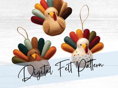 two felt turkeys hanging from strings on a white wooden background with the words digital felt pattern