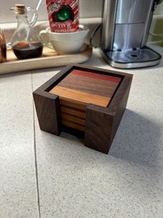 a wooden box sitting on top of a counter