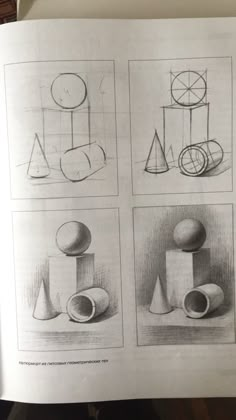 an open book with four different drawings on it's pages, including shapes and lines