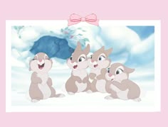 a group of chipmuns standing in the snow with a pink bow on their head