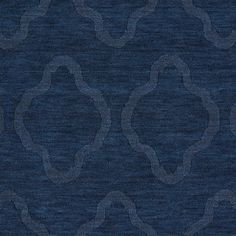 an upholstered blue rug with circular links on it