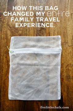 a white mesh bag with the words how this bag changed my entire family travel experience