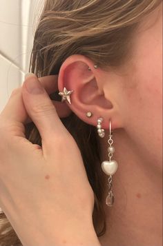 Stacked Ear Piercings Minimalist, Cool Ear Piercings Baddie, Earring Combos Ear Piercings, Triple Earlobe Piercing Ideas, Chunky Ear Piercings, Silver Earring Stack Inspiration, Silver Earscape, Earscapes Silver