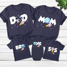 three matching shirts with the word dad and two children's t - shirts on them