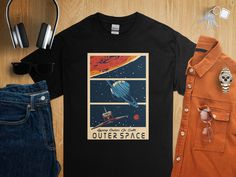 Embrace the final frontier with this unique Vintage Space Cruise Poster T-Shirt. Perfect for fans of retro sci-fi and space travel, this shirt features a stylized graphic of a cosmic journey, complete with planets and a vintage spaceship. Whether you're shopping for a fun addition to your wardrobe or a gift for the space enthusiast in your life, this tee is sure to delight. Made with high-quality cotton for comfort and durability, it's ideal for everyday wear or your next space-themed event! Space City Shirt, Vintage Spaceship, Space Enthusiast, Space Concept, Retro Sci Fi, Travel Tees, Vintage Space, Space Travel, Outer Space